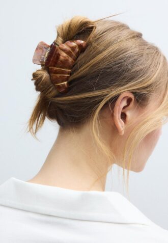 Barrette en forme de croissant