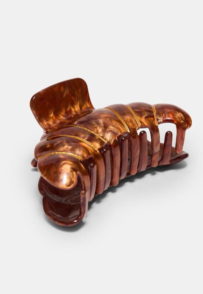 Barrette en forme de croissant