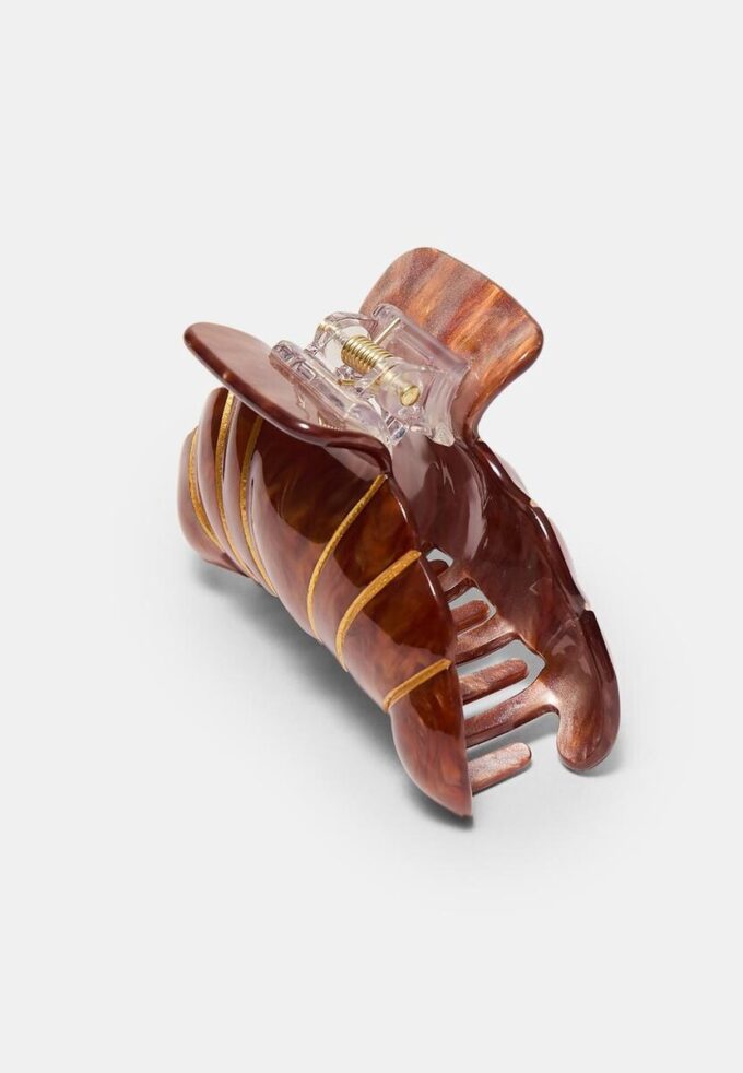 Barrette en forme de croissant