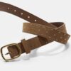 Ceinture à clous dorés