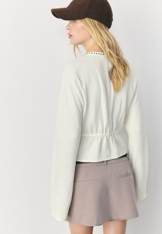 Chemise ajourée cloutée