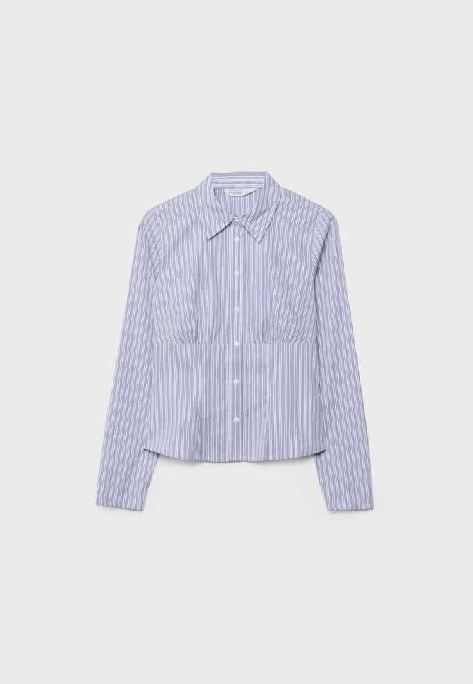 Chemise ajustée avec couture sous la poitrine