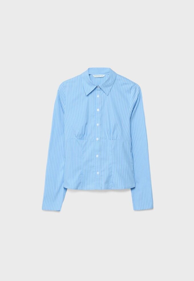 Chemise ajustée avec couture sous la poitrine