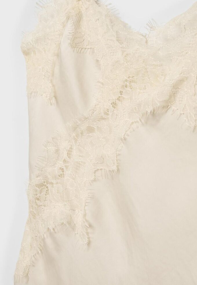 Haut asymétrique en dentelle