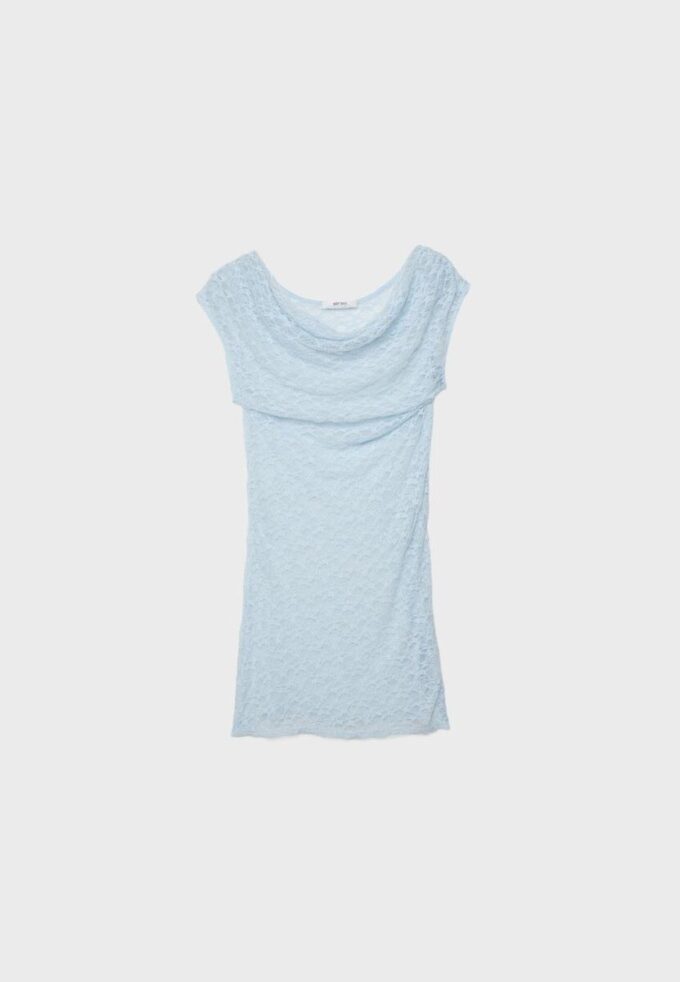 Haut en dentelle avec fronces sur les côtés