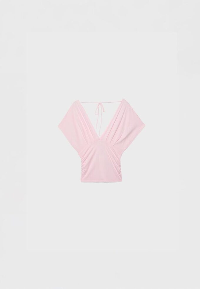 Hauts à col en V avec ceinture