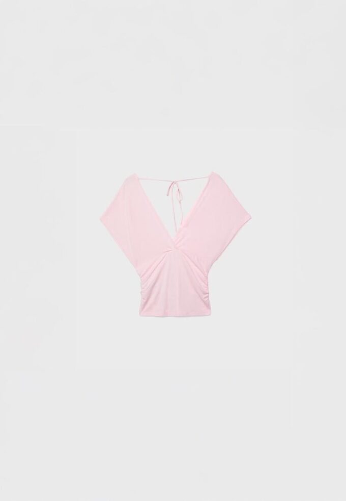 Hauts à col en V avec ceinture