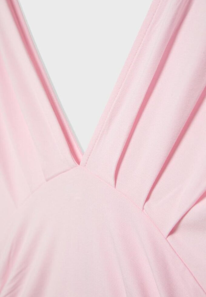 Hauts à col en V avec ceinture