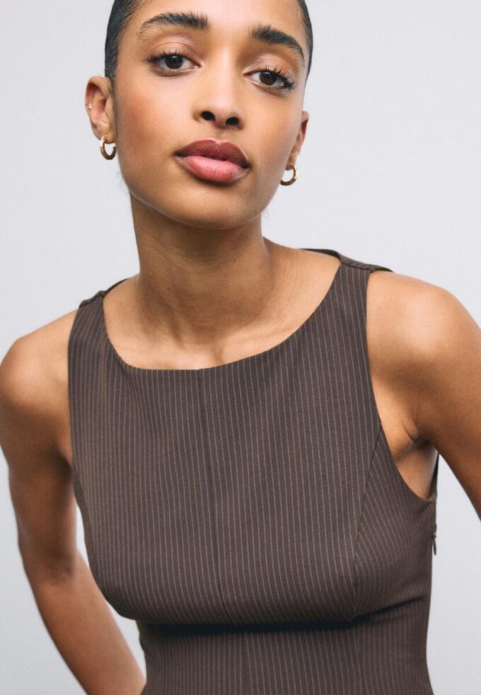 Hauts sans manches à basque Hauts sans manches à basque