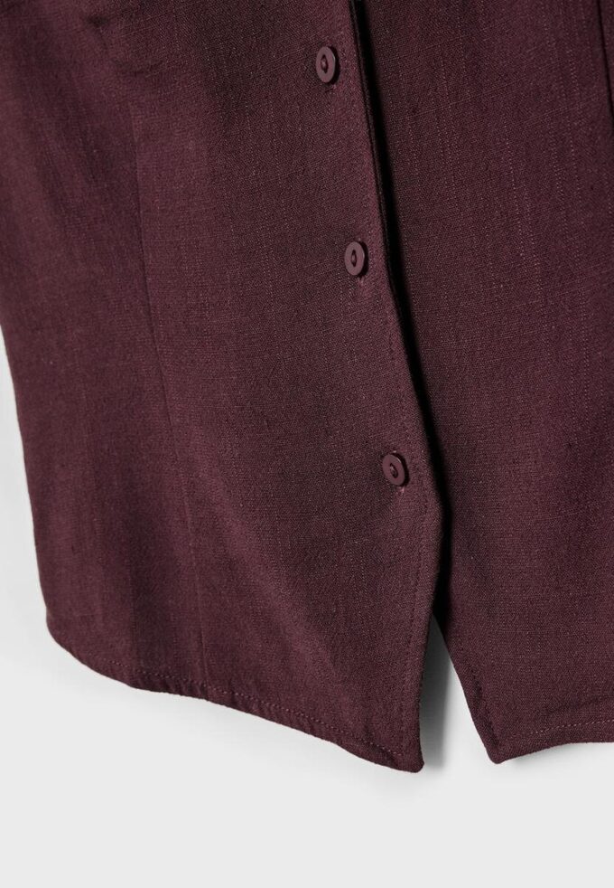 Hauts sans manches boutonnés