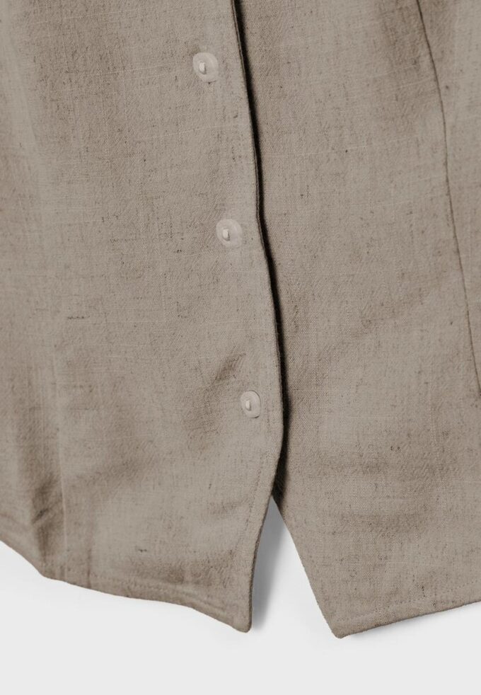 Hauts sans manches boutonnés