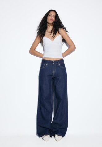 Jean taille basse à double bouton