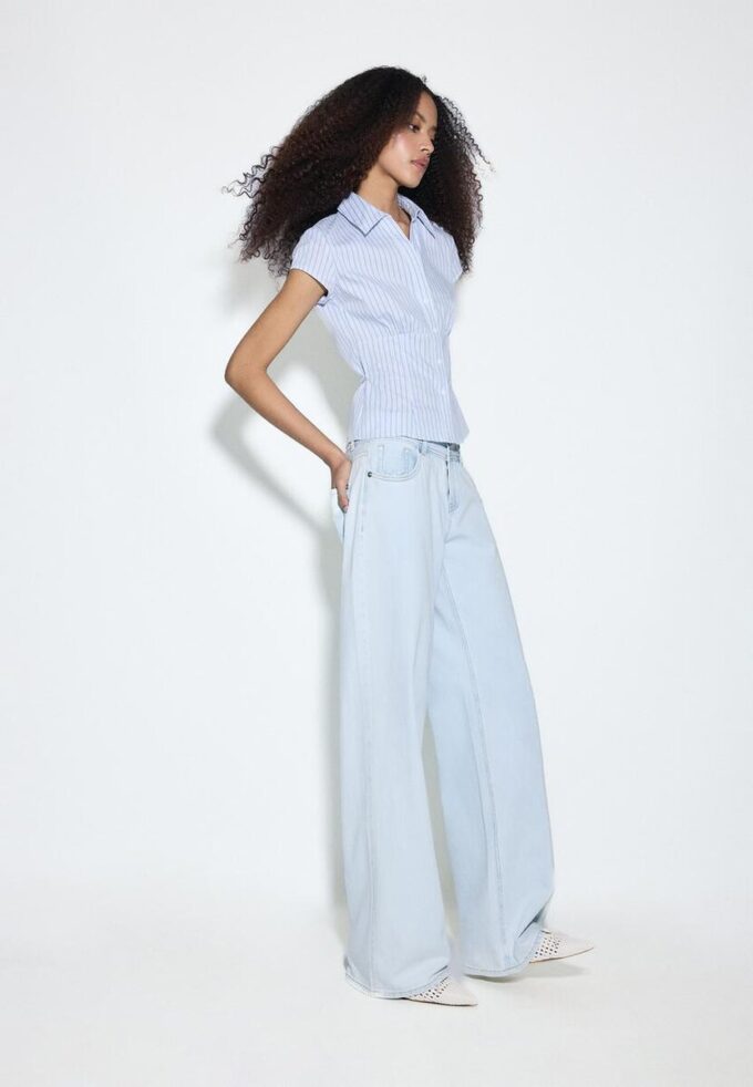 Jean taille basse à double bouton