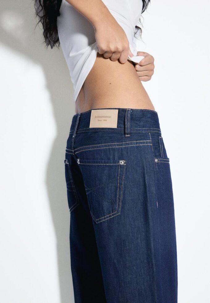 Jean taille basse à double bouton