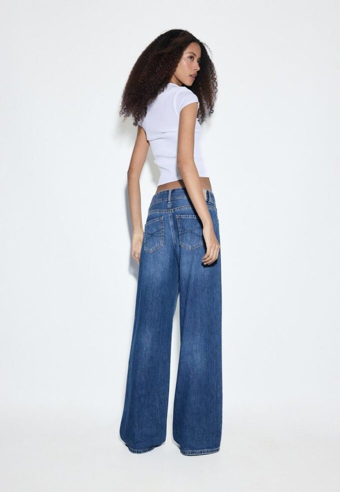 Jean taille basse à double bouton