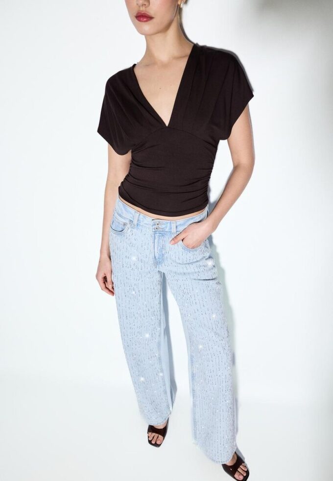 Jean taille basse à jambes Wide Leg avec strass