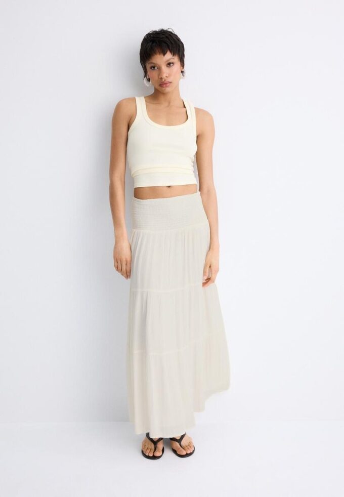 Jupe à panneaux avec fils métalliques Jupe à panneaux avec fils métalliques