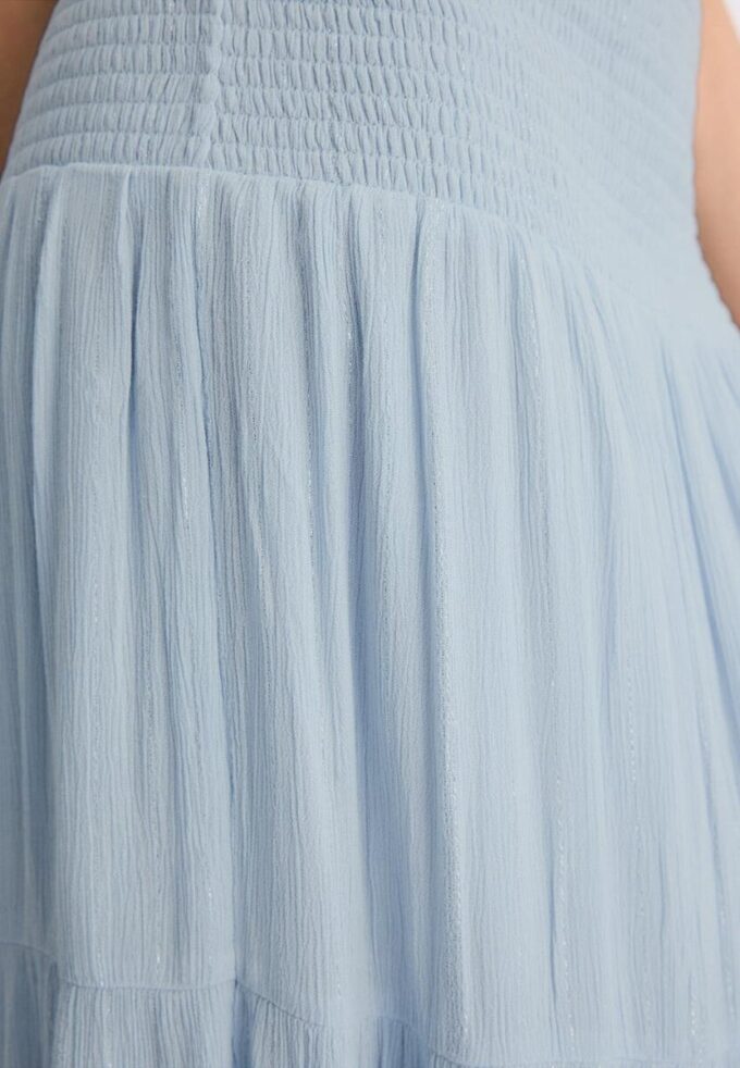 Jupe à panneaux avec fils métalliques Jupe à panneaux avec fils métalliques