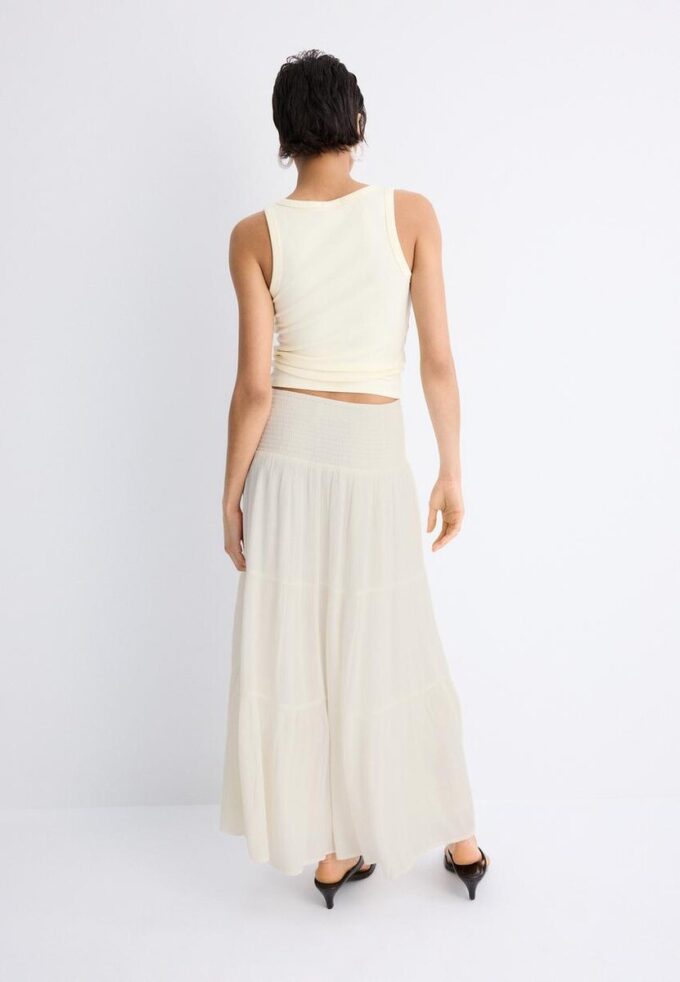 Jupe à panneaux avec fils métalliques Jupe à panneaux avec fils métalliques