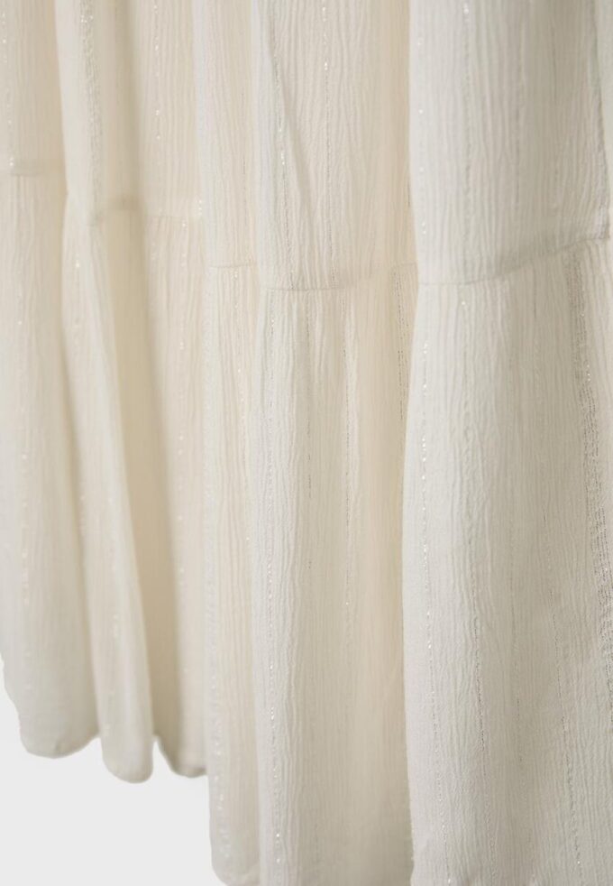 Jupe à panneaux avec fils métalliques Jupe à panneaux avec fils métalliques