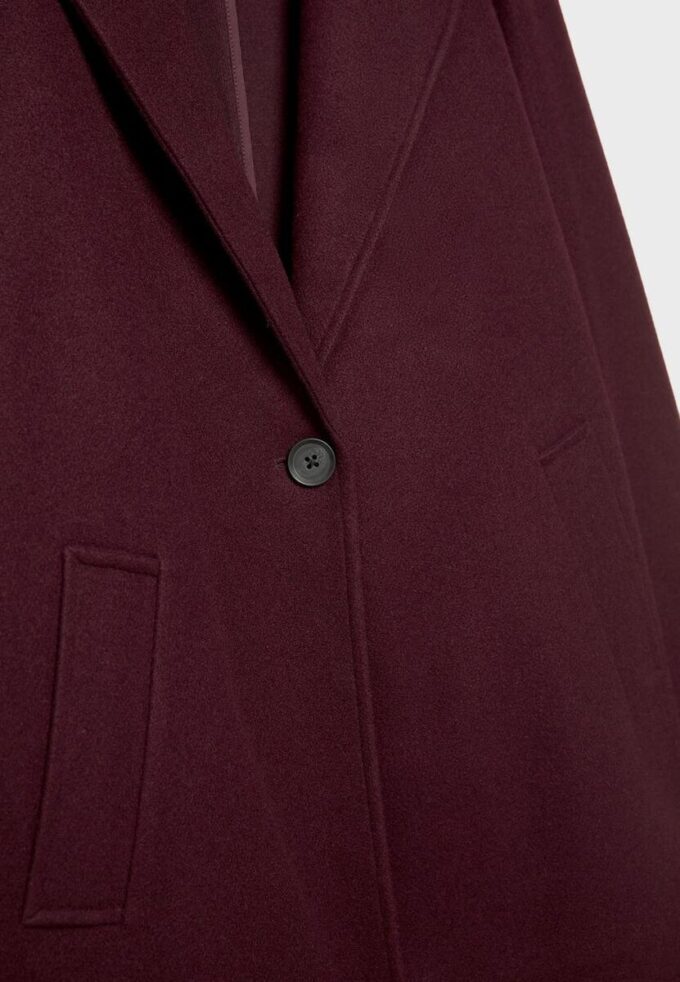 Manteau mi-long boutonné au toucher doux