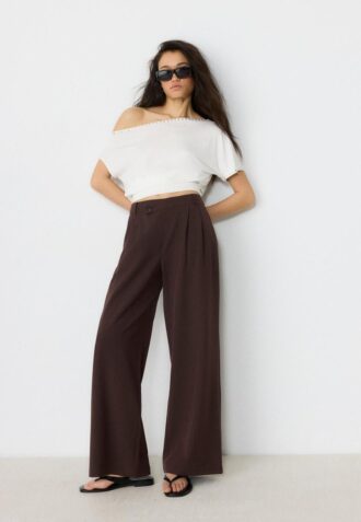Pantalon chic décontracté à rayures avec ceinture croisée