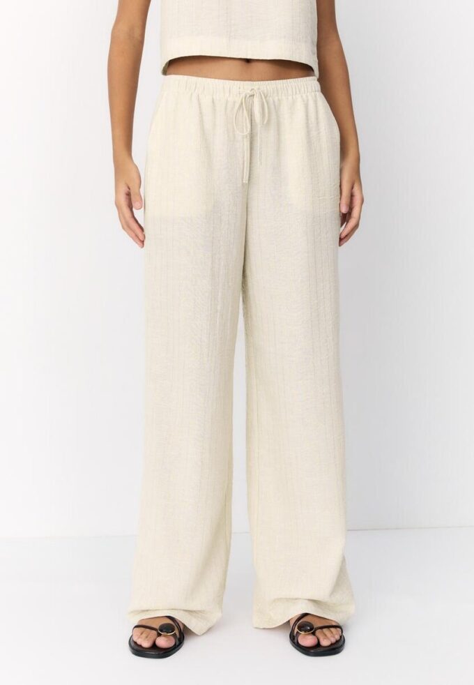 Pantalon fluide effet lin à fils métalliques