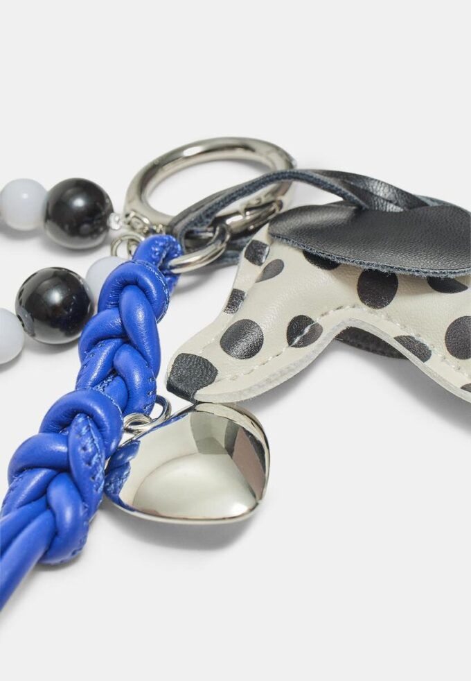 Porte-clés avec breloque chien à pois