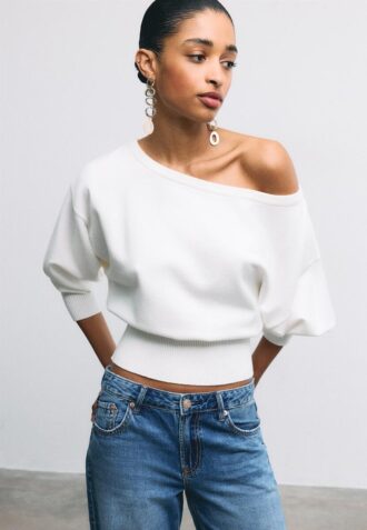 Pull en maille à ourlet côtelé asymétrique