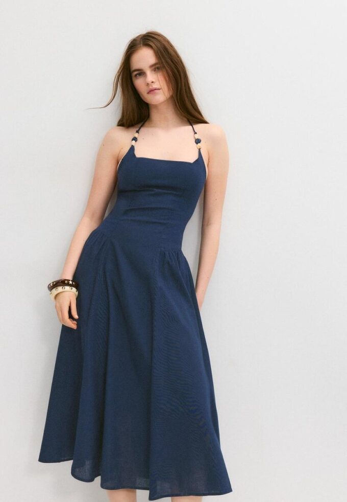 Robe midi dos nu avec détails en perles