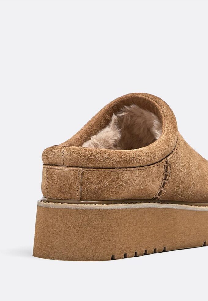 Sabots plats en cuir