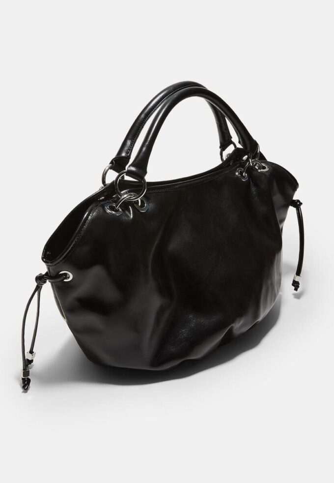 Sac cabas rond avec détails métalliques