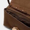 Sac en simili-suède avec fermoir métallique asymétrique
