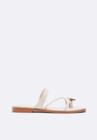 Sandales plates avec détails en pierre