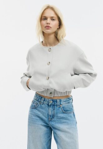 Veste à col rond et manches bouffantes