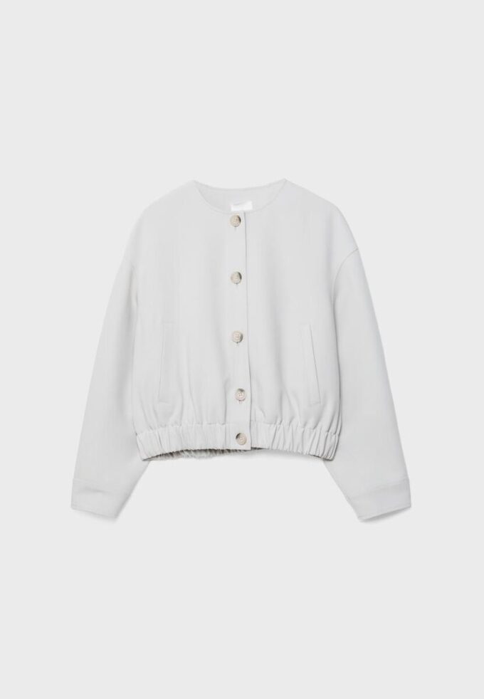 Veste à col rond et manches bouffantes