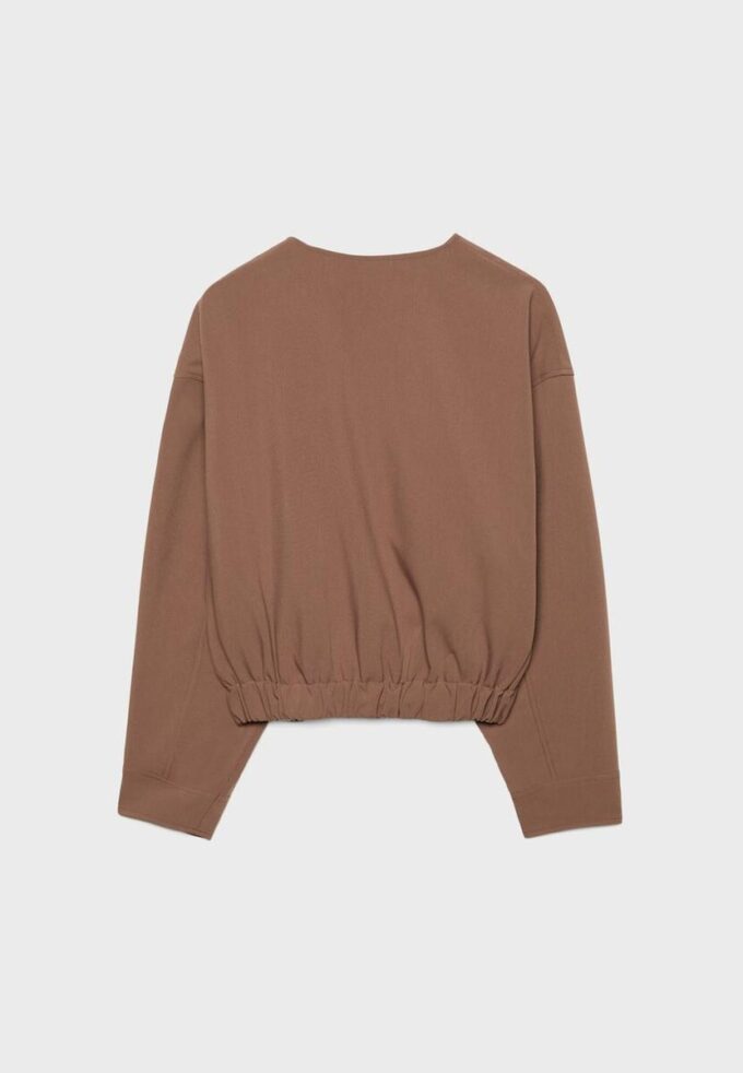 Veste à col rond et manches bouffantes