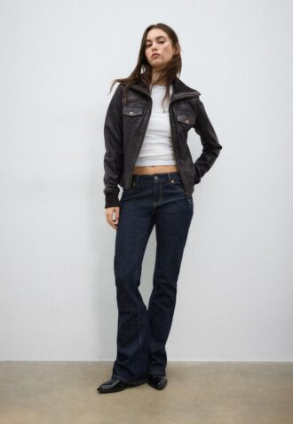 Veste en cuir combinée à côtes