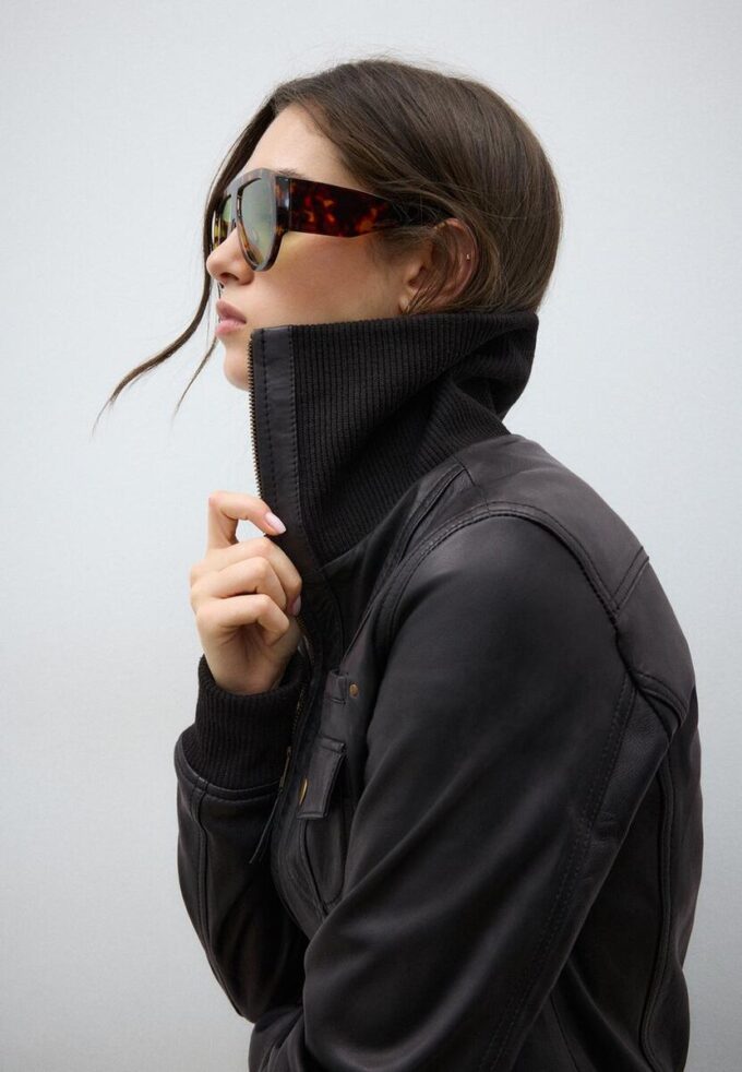 Veste en cuir combinée à côtes